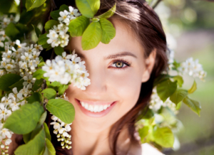 young woman with beautiful smile enjoying the outdoors