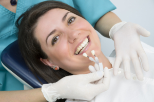woman at dentist deciding on dental implants