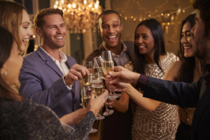 friends making a toast at a Christmas party