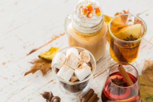 four holiday beverages on table