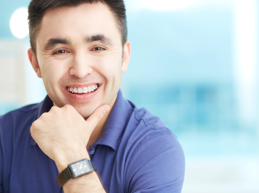 portrait of man with braces